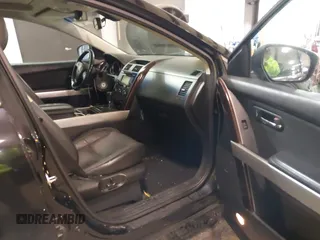 2015 Mazda CX-9 Grand Touring with VIN JM3TB3DV3F0460493, listed as a IAAI auction lot 41053565 with 213,124 mi miles. Bid and sale history available at carsss.com. Image 5.