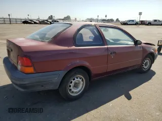 1996 Toyota Tercel DX z VIN JT2AC52L8T0124403, wystawiony jako Copart lot #66195834 z przebiegiem 137 467 mil mil oraz Szkody całkowita. Historia ofert i sprzedaży dostępna na DreamBid. Obrazek 3.