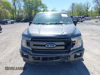 2018 Ford F-150 XL with VIN 1FTEW1EG2JFE55513, listed as a IAAI auction lot 41530354 with 132,617 mi miles. Bid and sale history available at carsss.com. Image 12.