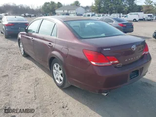 2005 Toyota Avalon XL with VIN 4T1BK36B25U057969, listed as a IAAI auction lot 41798579 with 241,831 mi miles. Bid and sale history available at carsss.com. Image 3.