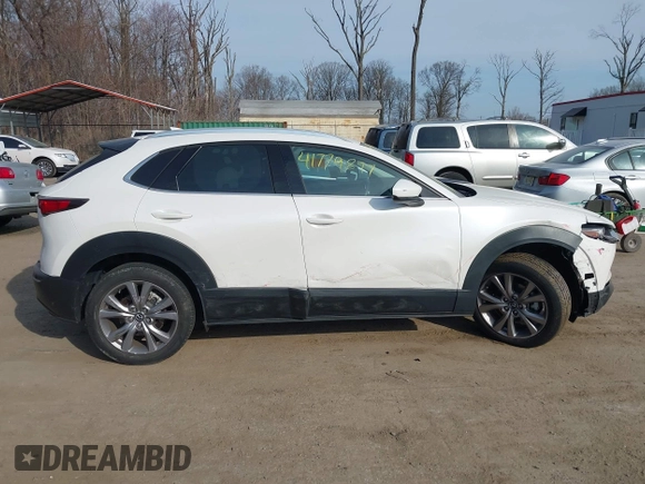 2022 Mazda CX-30 S Premium with VIN 3MVDMBDL7NM412263, listed as a IAAI auction lot 41779877 with 42,088 mi miles and . Bid and sale history available at carsss.com. Image 12.