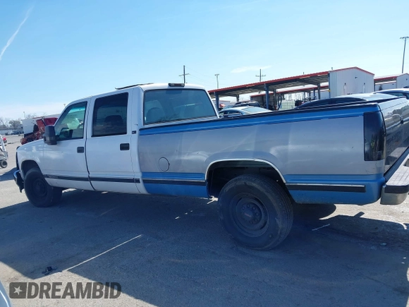 1996 GMC Sierra 1500 with VIN 1GTGC33R4TF018147, listed as a IAAI auction lot 41612770 with 106,443 mi miles and . Bid and sale history available at DreamBid. Image 14.