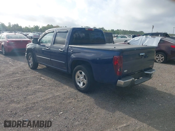 2009 GMC Canyon SLE1 with VIN 1GTCS139298121036, listed as a IAAI auction lot 41953007 with 230,957 mi miles. Bid and sale history available at carsss.com. Image 3.