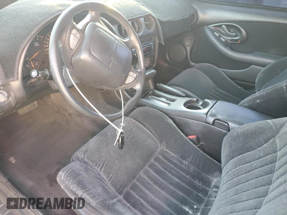 2001 Pontiac Firebird Firebird с VIN 2G2FS22K512112795, выставлен на аукционе Copart как лот 89408335 с пробегом 125 715 миль миль и Чистый • Clean title. История ставок и продаж доступна на DreamBid. Изображение 7.