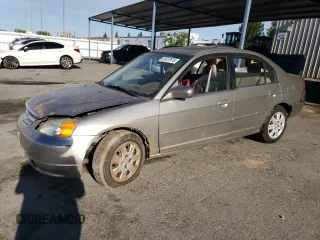 2003 Honda Civic EX with VIN 2HGES26723H510318, listed as a Copart auction lot 52037615 with 210,140 mi miles and Salvage Title. Bid and sale history available at carsss.com. Image 1.