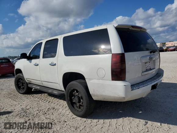 2011 Chevrolet Suburban z VIN 1GNWK5EG0BR121950, wystawiony jako Copart lot #82678394 z przebiegiem 154 952 mil mil oraz Szkoda całkowita • Salvage title. Historia ofert i sprzedaży dostępna na DreamBid. Obrazek 2.