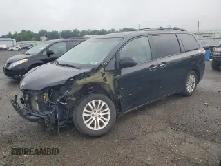 2015 Toyota Sienna XLE with VIN 5TDYK3DC6FS531521, listed as a Copart auction lot 62923695 with 135,782 mi miles and Salvage title. Bid and sale history available at DreamBid. Image 1.