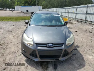 2013 Ford Focus SE z VIN 1FADP3F26DL344904, wystawiony jako Copart lot #59965505 z przebiegiem 162 202 mil mil oraz Czysty tytuł • Clean title. Historia ofert i sprzedaży dostępna na DreamBid. Obrazek 5.