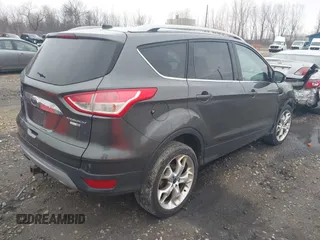 2015 Ford Escape Titanium with VIN 1FMCU9J94FUB49236, listed as a IAAI auction lot 42117378 with 112,267 mi miles. Bid and sale history available at carsss.com. Image 4.