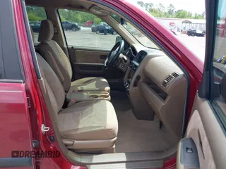 2002 Honda CR-V LX with VIN JHLRD68442C011268, listed as a IAAI auction lot 41962057 with 149,209 mi miles and . Bid and sale history available at carsss.com. Image 5.