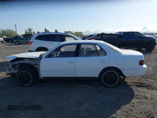 1995 Toyota Camry LE z VIN JT2SK12E5S0332027, wystawiony jako IAAI lot #42078977 z przebiegiem 128 929 mil mil oraz . Historia ofert i sprzedaży dostępna na DreamBid. Obrazek 15.