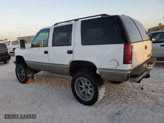 1999 Chevrolet Tahoe with VIN 1GNEC13R2XJ556769, listed as a Copart auction lot 77561624 with 205,238 mi miles and Non Repairable. Bid and sale history available at carsss.com. Image 2.