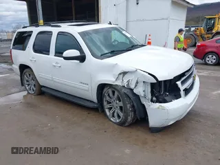 2013 Chevrolet Tahoe LT with VIN 1GNSKBE05DR293054, listed as a IAAI auction lot 41955877 with 192,474 mi miles and . Bid and sale history available at DreamBid. Image 1.