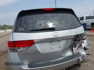 2014 Honda Odyssey EX-L with VIN 5FNRL5H60EB115792, listed as a IAAI auction lot 42064607 with 191,055 mi miles and . Bid and sale history available at carsss.com. Image 16.