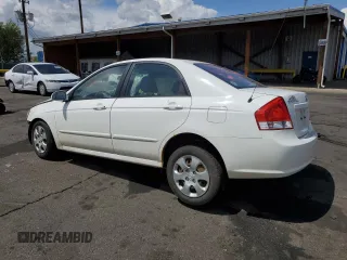 2009 Kia Spectra LX with VIN KNAFE221995630318, listed as a Copart auction lot 55817285 with Not provided miles and Non repairable. Bid and sale history available at DreamBid. Image 2.
