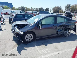 2020 Toyota Prius L Eco with VIN JTDKARFU3L3111990, listed as a IAAI auction lot 41964834 with 67,873 mi miles. Bid and sale history available at carsss.com. Image 14.