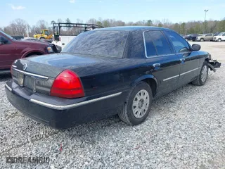 2006 Mercury Grand Marquis GS with VIN 2MEFM74W26X632447, listed as a IAAI auction lot 41564231 with 131,563 mi miles. Bid and sale history available at carsss.com. Image 4.