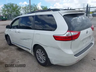 2016 Toyota Sienna XLE with VIN 5TDYK3DC4GS702638, listed as a IAAI auction lot 42255793 with 124,977 mi miles and . Bid and sale history available at DreamBid. Image 3.
