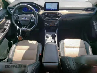 2021 Ford Escape Titanium Hybrid z VIN 1FMCU0DZ6MUA03327, wystawiony jako Copart lot #59558845 z przebiegiem 67 569 mil mil oraz Czysty tytuł • Clean title. Historia ofert i sprzedaży dostępna na DreamBid. Obrazek 8.
