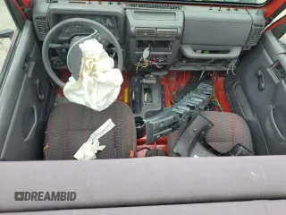 2000 Jeep Wrangler SE with VIN 1J4FA29P6YP793045, listed as a Copart auction lot 58756715 with 202,110 mi miles and Salvage title. Bid and sale history available at DreamBid. Image 8.