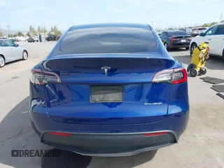 2020 Tesla Model Y Long Range with VIN 5YJYGDEE1LF006227, listed as a IAAI auction lot 42100833 with 49,761 mi miles and . Bid and sale history available at DreamBid. Image 17.