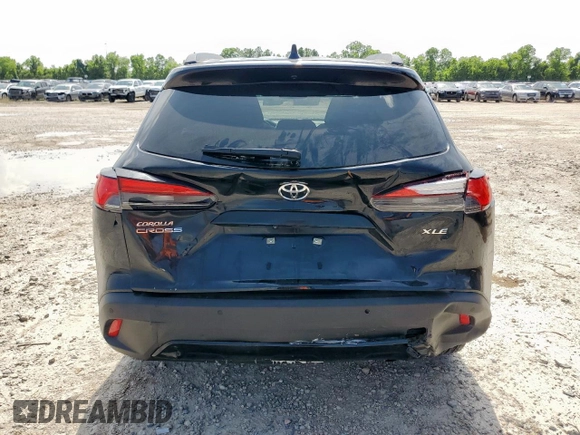 2023 Toyota Corolla Cross XLE with VIN 7MUDAAAG2PV072301, listed as a Copart auction lot 63484815 with 25,017 mi miles and Salvage title. Bid and sale history available at DreamBid. Image 6.