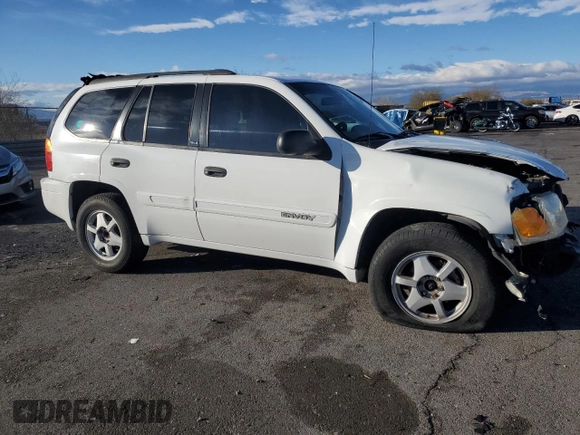 2003 GMC Envoy SLT with VIN 1GKDT13S232405530, listed as a Copart auction lot 45555865 with 138,680 mi miles and Salvage Title. Bid and sale history available at carsss.com. Image 4.