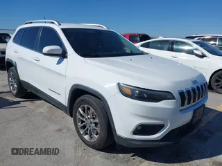 2019 Jeep Cherokee Latitude Plus with VIN 1C4PJLLNXKD290098, listed as a IAAI auction lot 40840063 with 202,244 mi miles. Bid and sale history available at carsss.com. Image 1.