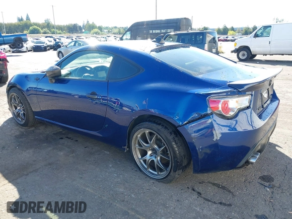 2013 Scion FR-S with VIN JF1ZNAA11D2702415, listed as a IAAI auction lot 40381041 with 63,581 mi miles. Bid and sale history available at carsss.com. Image 6.