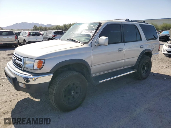 1999 Toyota 4Runner SR5 with VIN JT3GN86R4X0099618, listed as a Copart auction lot 58204145 with 297,759 mi miles and Salvage title. Bid and sale history available at DreamBid. Image 1.