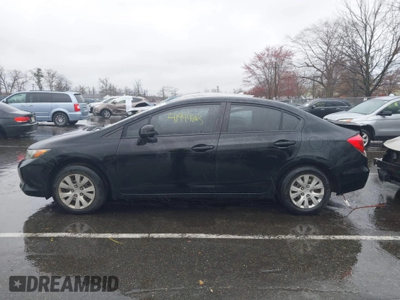 2012 Honda Civic LX with VIN 2HGFB2F5XCH605230, listed as a IAAI auction lot 41999663 with 221,815 mi miles and . Bid and sale history available at DreamBid. Image 14.