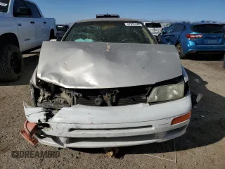 1998 Nissan Maxima GXE with VIN JN1CA21D0WM903051, listed as a Copart auction lot 47821445 with 156,748 mi miles and Salvage title. Bid and sale history available at DreamBid. Image 5.