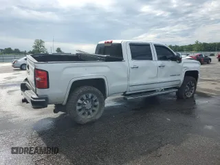 2017 GMC Sierra 2500HD Denali z VIN 1GT12UEY0HF216704, wystawiony jako Copart lot #56409765 z przebiegiem 111 525 mil mil oraz Szkoda całkowita • Salvage title. Historia ofert i sprzedaży dostępna na DreamBid. Obrazek 3.