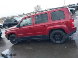 2015 Jeep Patriot Altitude Edition with VIN 1C4NJPBA1FD342995, listed as a IAAI auction lot 41796470 with 130,303 mi miles. Bid and sale history available at carsss.com. Image 14.
