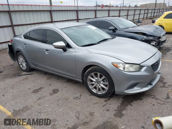 2015 Mazda 6 i Sport with VIN JM1GJ1U61F1176719, listed as a IAAI auction lot 41311837 with 131,865 mi miles. Bid and sale history available at carsss.com. Image 1.