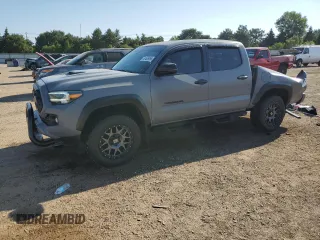 2020 Toyota Tacoma SR5 with VIN 3TMCZ5ANXLM315657, listed as a Copart auction lot 62495055 with 16,410 mi miles and Salvage title. Bid and sale history available at DreamBid. Image 1.