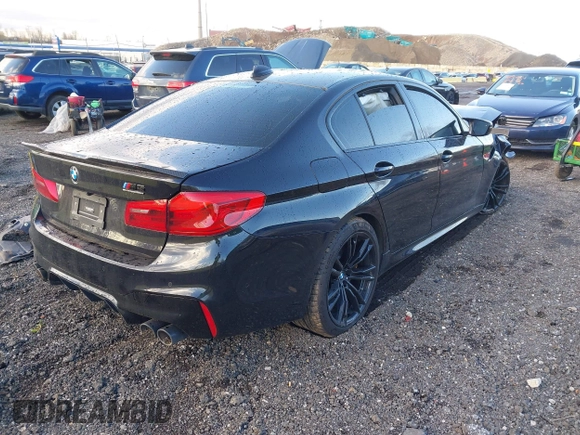 2019 BMW M5 Competition z VIN WBSJF0C59KB448103, wystawiony jako IAAI lot #41962677 z przebiegiem 42 455 mil mil oraz . Historia ofert i sprzedaży dostępna na DreamBid. Obrazek 4.