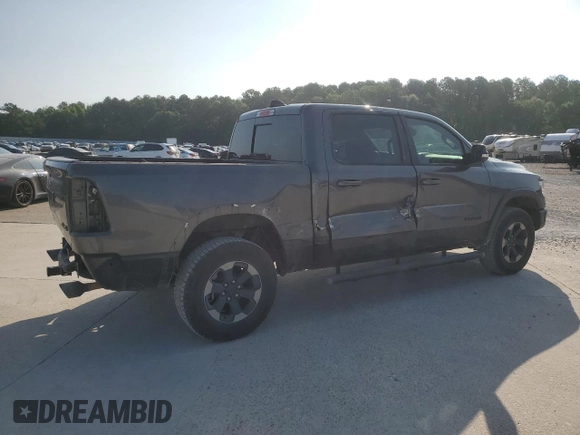 2020 Ram 1500 Rebel with VIN 1C6SRFLT4LN144723, listed as a Copart auction lot 59843935 with 90,936 mi miles and Salvage title. Bid and sale history available at DreamBid. Image 3.