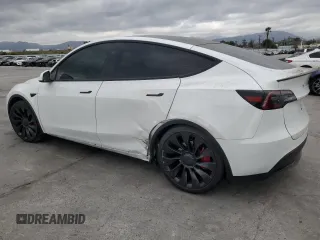 2023 Tesla Model Y Performance z VIN 7SAYGDEFXPF801908, wystawiony jako Copart lot #50737655 z przebiegiem Nie podano mil oraz Szkoda całkowita • Salvage title. Historia ofert i sprzedaży dostępna na DreamBid. Obrazek 2.
