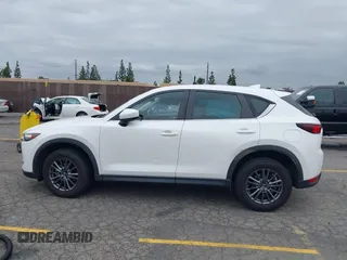 2019 Mazda CX-5 Sport with VIN JM3KFABM4K1565787, listed as a IAAI auction lot 42054585 with 80,580 mi miles and . Bid and sale history available at DreamBid. Image 14.