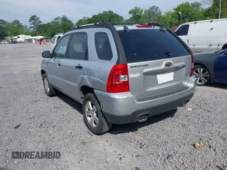 2009 Kia Sportage LX with VIN KNDJF724097567972, listed as a IAAI auction lot 42101204 with 221,299 mi miles. Bid and sale history available at carsss.com. Image 3.