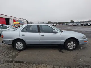 1994 Toyota Camry LE with VIN JT2SK12E2R0207688, listed as a IAAI auction lot 41323827 with 162,680 mi miles. Bid and sale history available at carsss.com. Image 13.