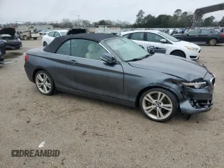 2015 BMW 2 Series 228i with VIN WBA1K5C57FV474037, listed as a Copart auction lot 87857635 with 91,333 mi miles and Salvage title. Bid and sale history available at DreamBid. Image 4.