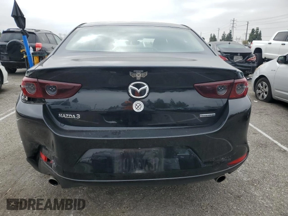 2021 Mazda 3 2.0 with VIN 3MZBPAA71MM202769, listed as a Copart auction lot 43660765 with 93,456 mi miles and Salvage Title. Bid and sale history available at DreamBid. Image 6.