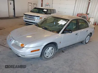 2001 Saturn SL z VIN 1G8ZF52841Z208220, wystawiony jako IAAI lot #42288195 z przebiegiem Nie podano mil oraz . Historia ofert i sprzedaży dostępna na DreamBid. Obrazek 2.