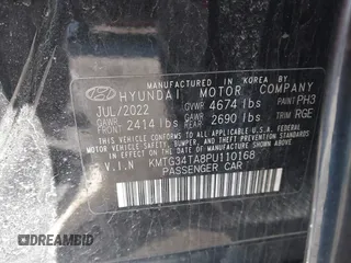 2023 Genesis G70 2.0T z VIN KMTG34TA8PU110168, wystawiony jako IAAI lot #41924246 z przebiegiem 117 927 mil mil oraz . Historia ofert i sprzedaży dostępna na DreamBid. Obrazek 9.
