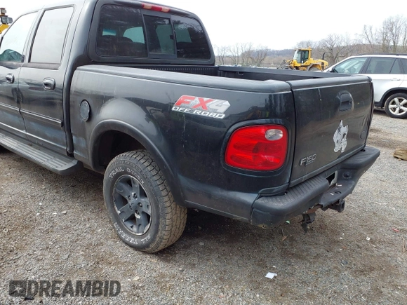 2002 Ford F-150 XLT with VIN 1FTRW08L12KB91777, listed as a IAAI auction lot 42007013 with 192,758 mi miles. Bid and sale history available at carsss.com. Image 3.