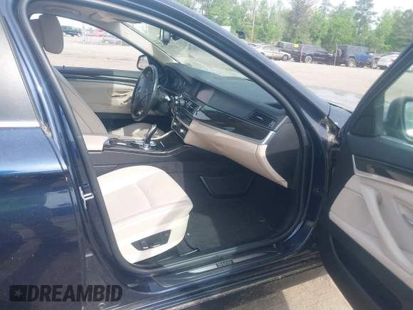 2013 BMW 5 Series 528i with VIN WBAXG5C52DD230956, listed as a IAAI auction lot 42107778 with 126,377 mi miles and . Bid and sale history available at carsss.com. Image 5.
