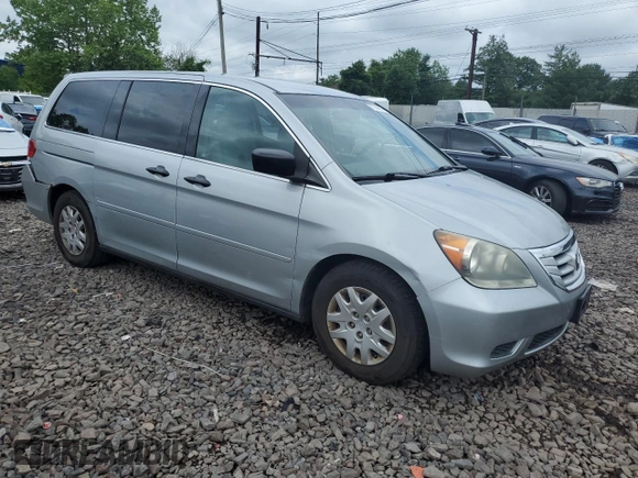 2010 Honda Odyssey LX with VIN 5FNRL3H2XAB059078, listed as a Copart auction lot 61144895 with 116,724 mi miles and Salvage title. Bid and sale history available at DreamBid. Image 4.