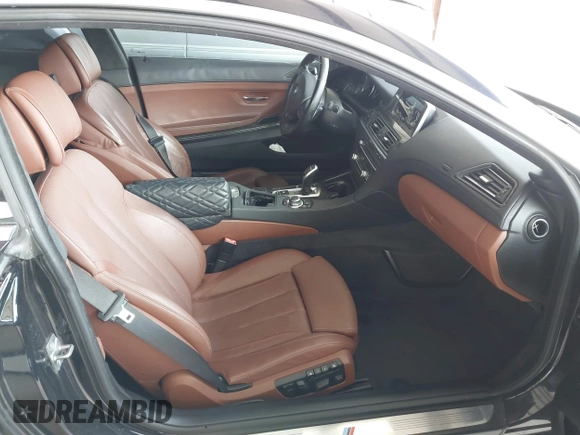 2012 BMW 6 Series 650i z VIN WBALX3C51CDV77602, wystawiony jako IAAI lot #41668235 z przebiegiem 103 684 mil mil oraz . Historia ofert i sprzedaży dostępna na DreamBid. Obrazek 5.